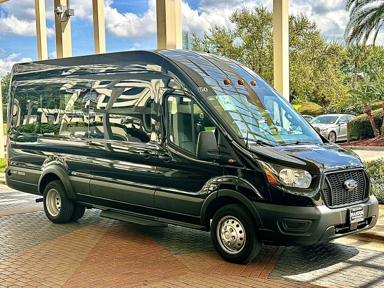 Black Ford Transit Executive for mini coach rental in Orange City, FL