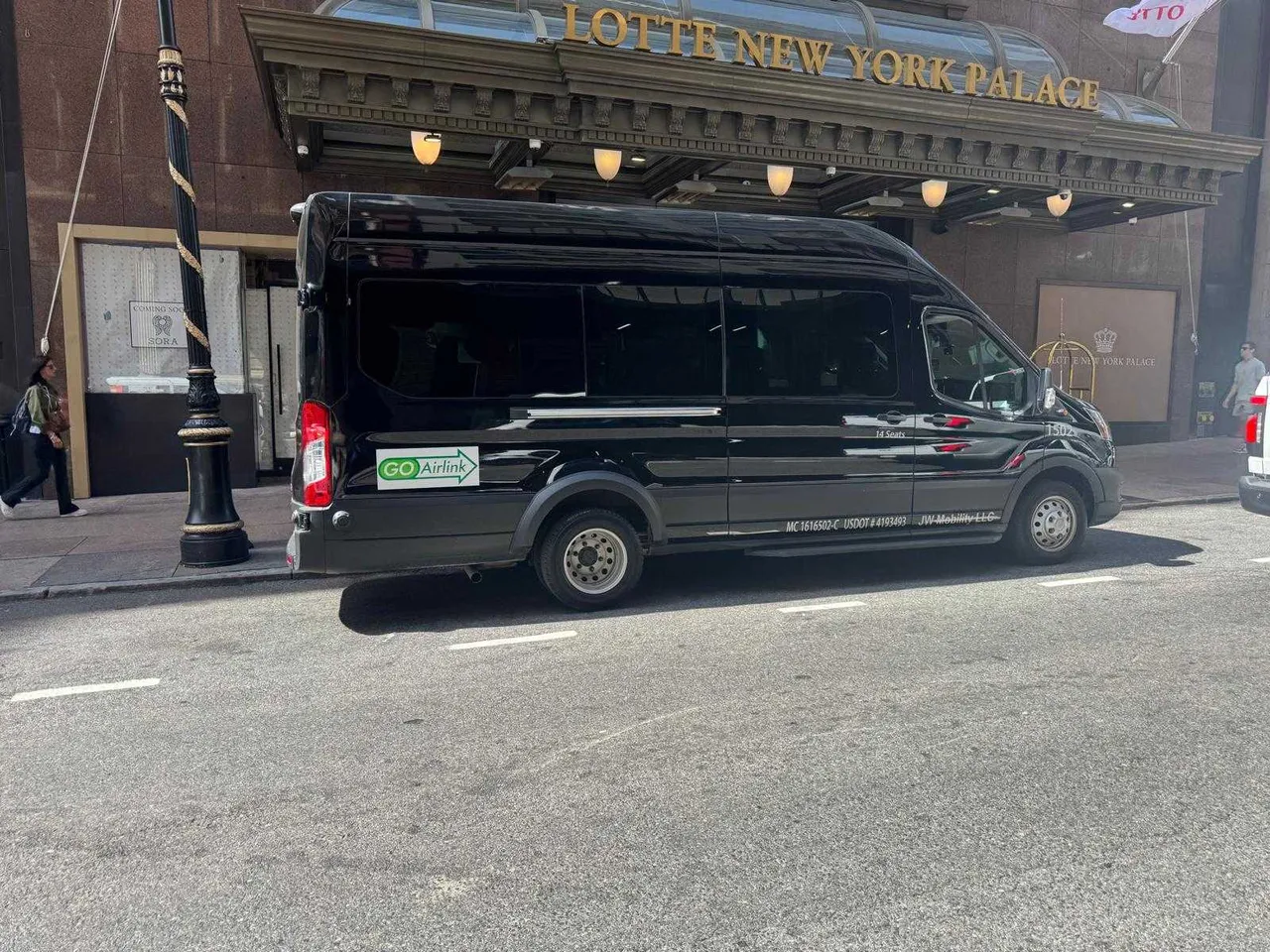 Black Ford Transit Sprinter for mini coach rental in Shoreham, NY