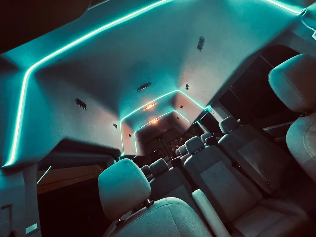 Ford Transit Van interior with high-roof cabin and LED ceiling lighting, photo 2 for minibus rental Ford Transit Van interior with high-roof cabin and LED ceiling lighting, photo 2 for minibus rental