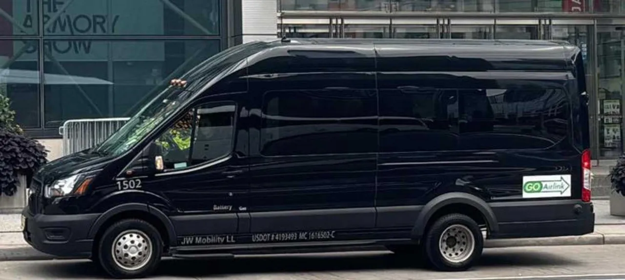 Black Ford Transit Van for mini coach rental in Guilford, CT