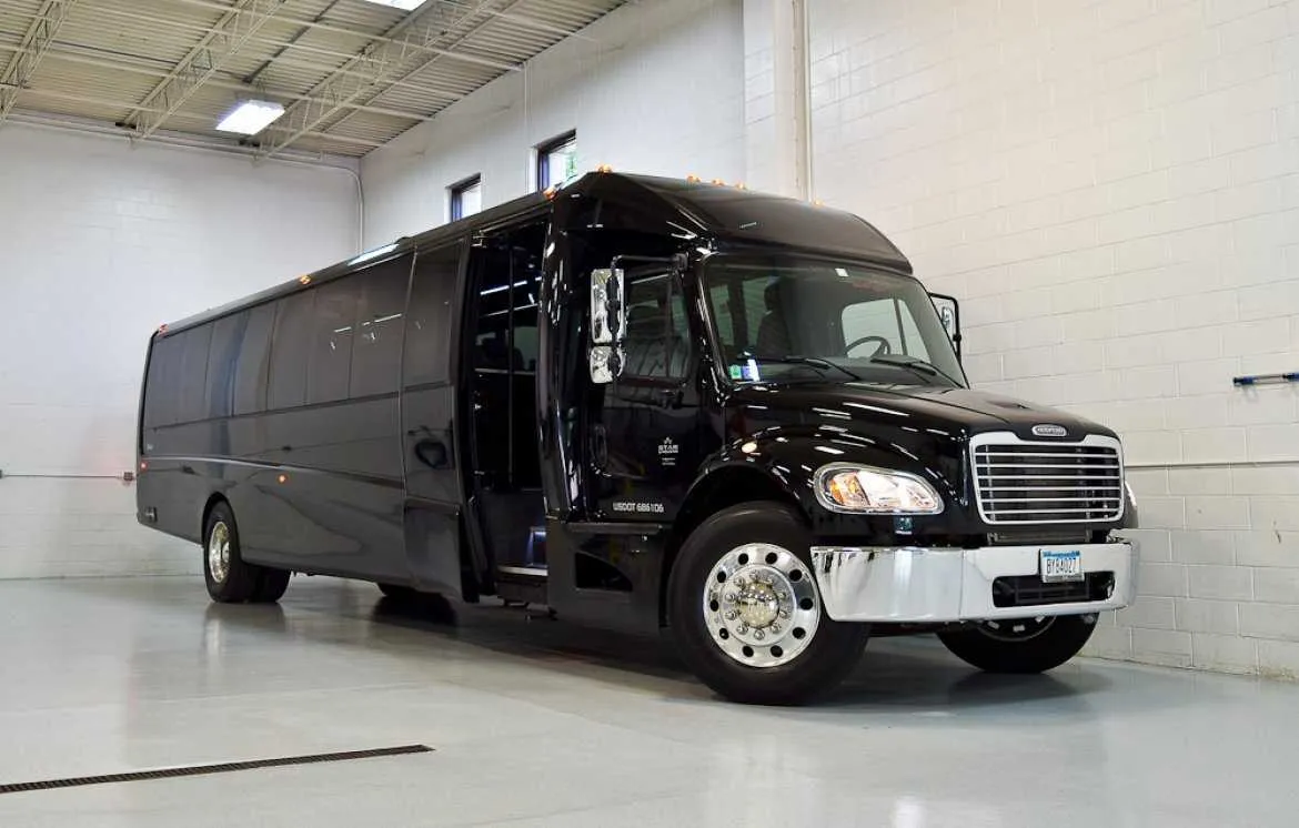 Black Freightliner Luxury Coach for charter bus rental in Glennville, GA