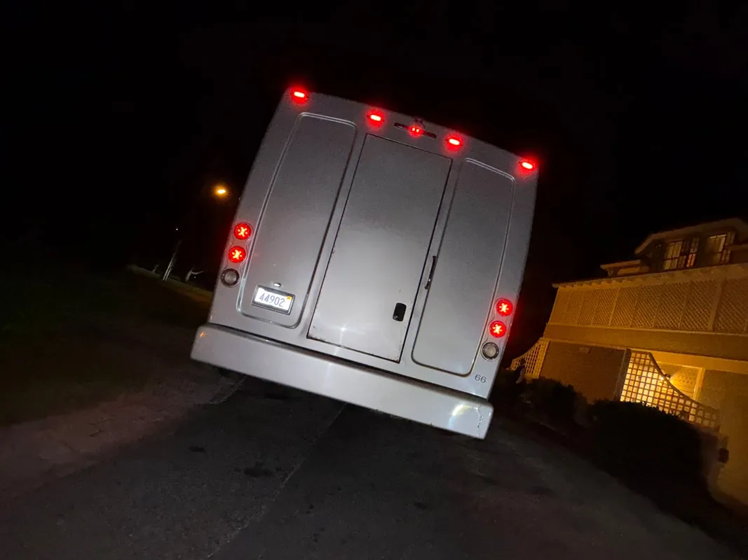 Silver Freightliner Party Bus exterior, photo 7 for party bus rental in North Attleboro, MA Silver Freightliner Party Bus exterior, photo 7 for party bus rental in North Attleboro, MA