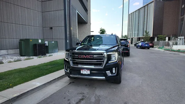 Black GMC Yukon exterior for mercedes V-Class rental in Aurora, CO