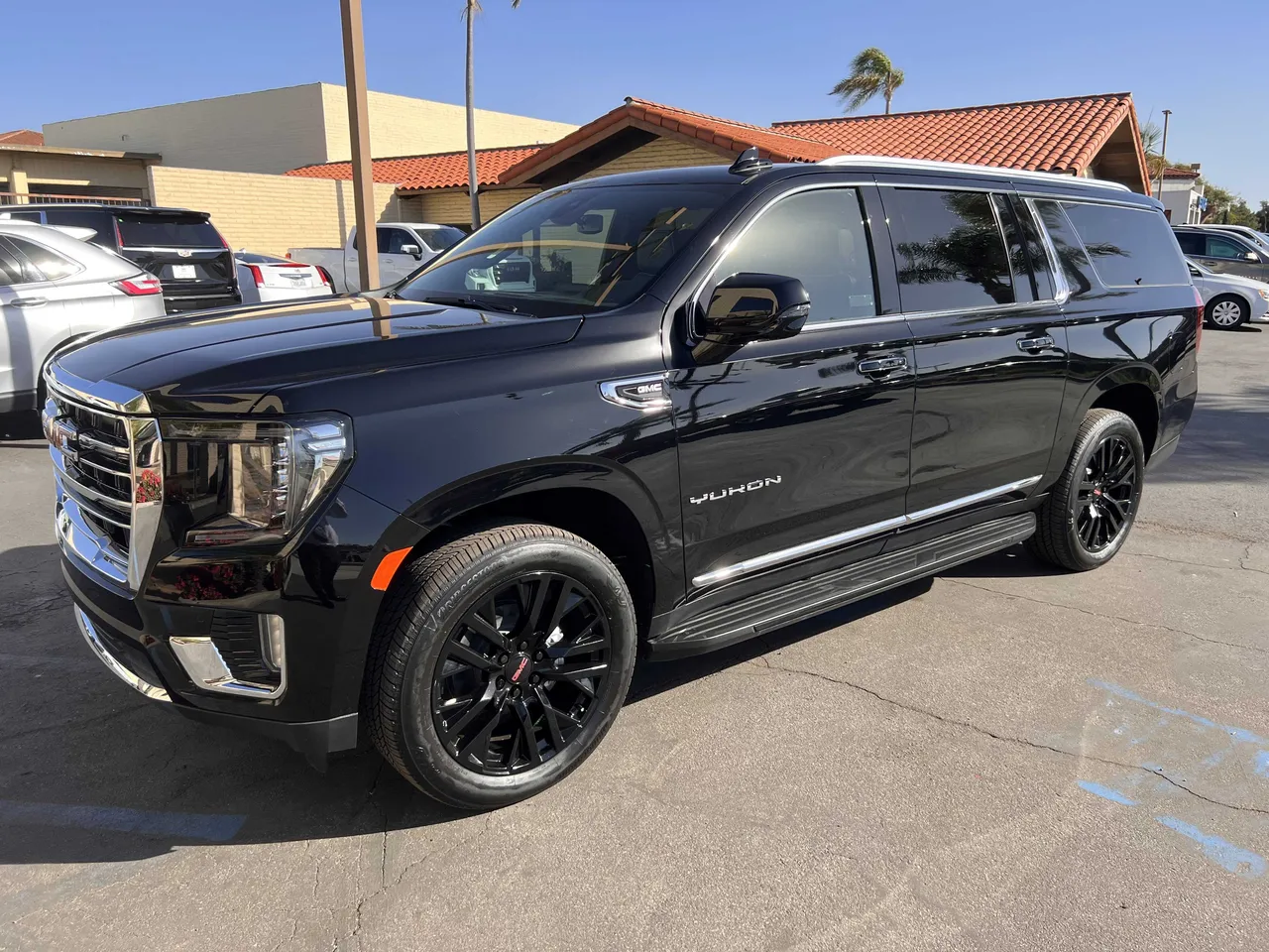 Black GMC Yukon for airport transfers in San Diego County, CA