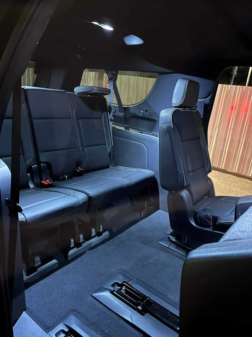 GMC Yukon interior with captain's chairs for airport transfers