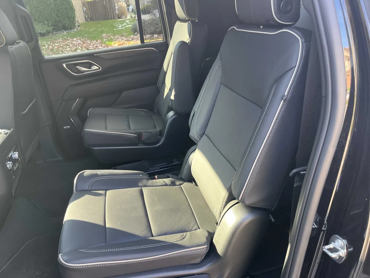 GMC Yukon interior with captain's chairs for airport transfers