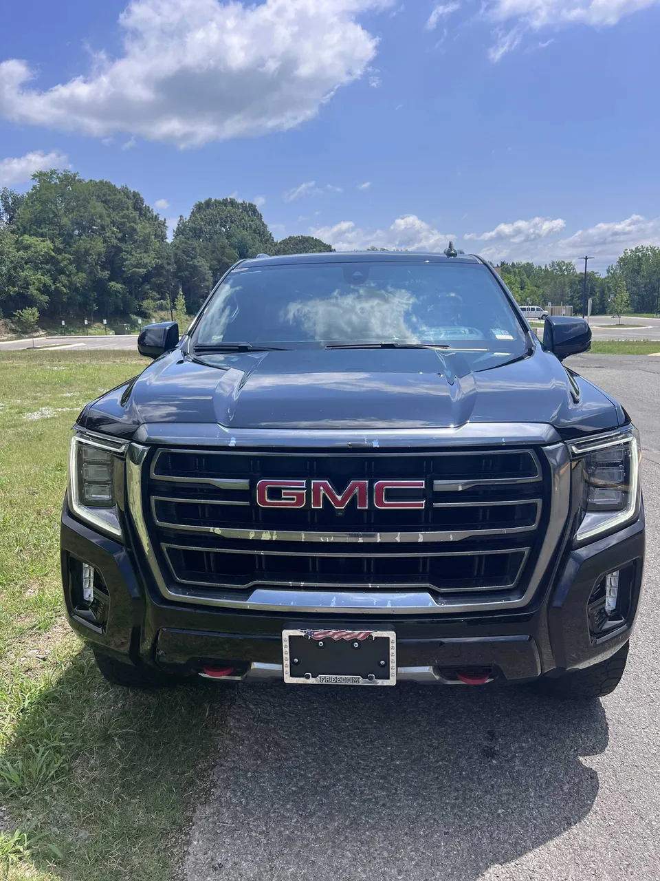 Black GMC Yukon XL exterior for chauffeur car rental in Nashville, TN