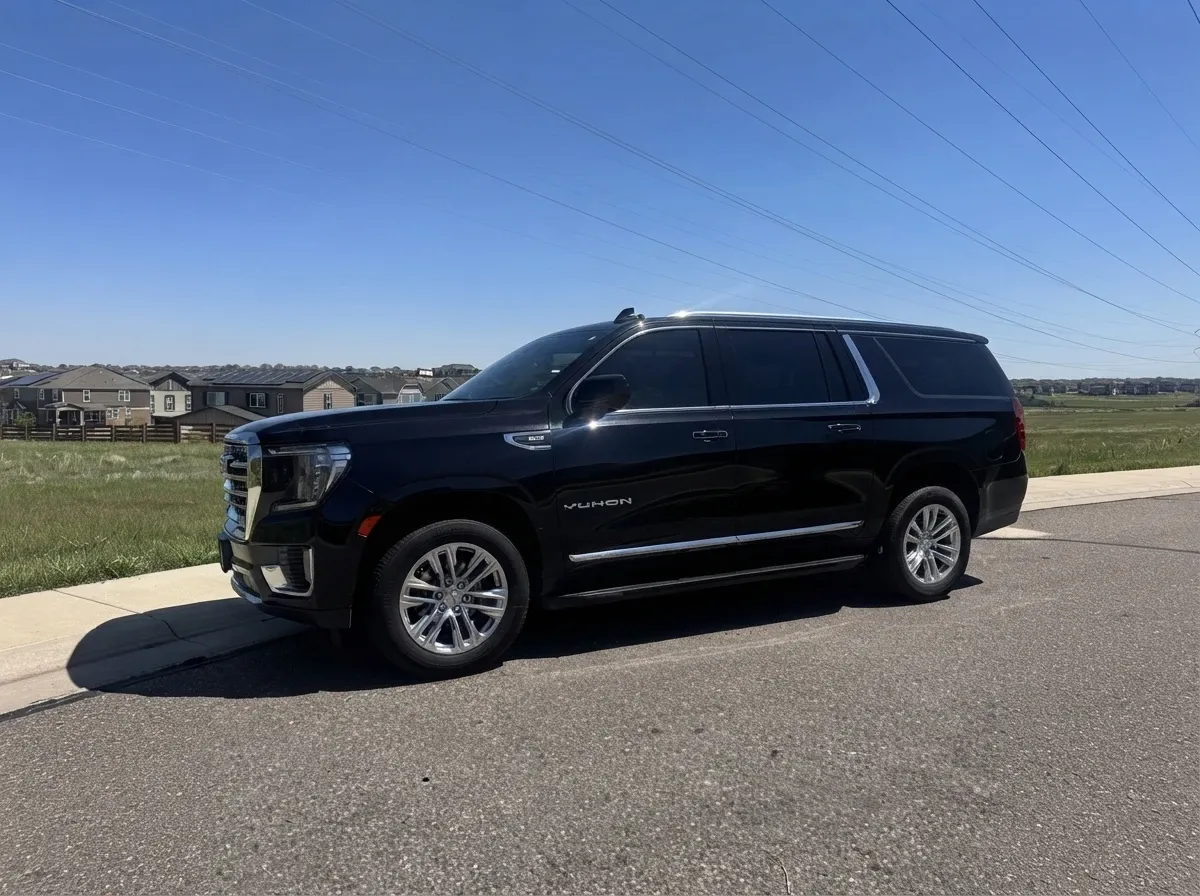 Black GMC Yukon XL for airport transfers
