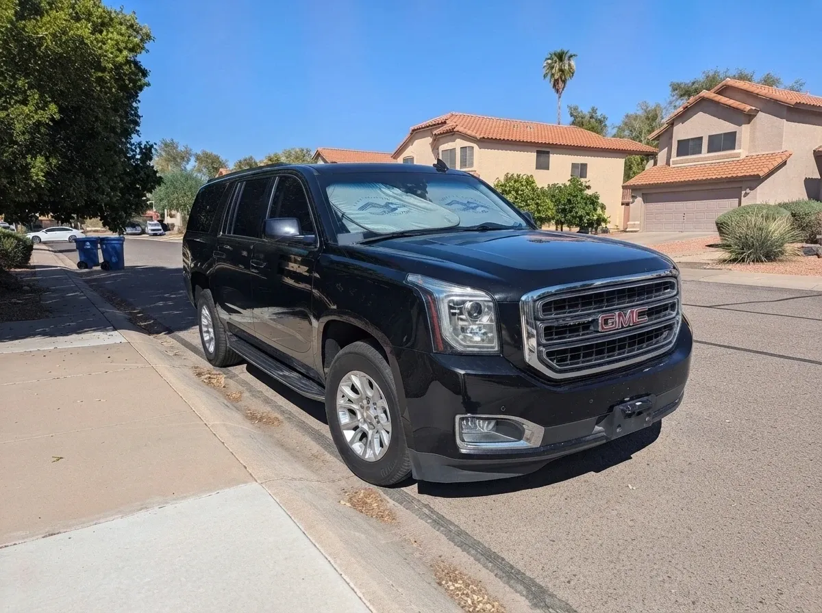 Black GMC Yukon XL for airport transfers Black GMC Yukon XL for airport transfers