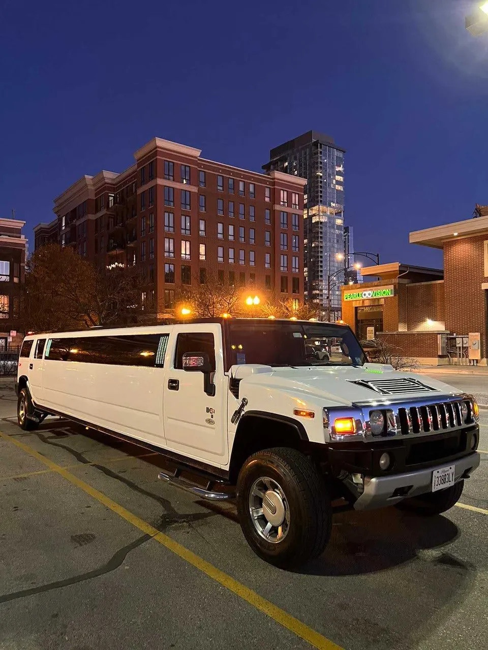 White Hummer H2 limo exterior, photo 2 for cadillac escalade limo in Mandan, ND