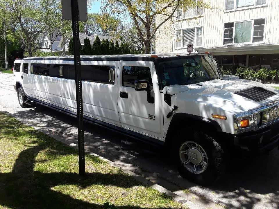 White Hummer H2 limo for cadillac escalade limo in Mandan, ND