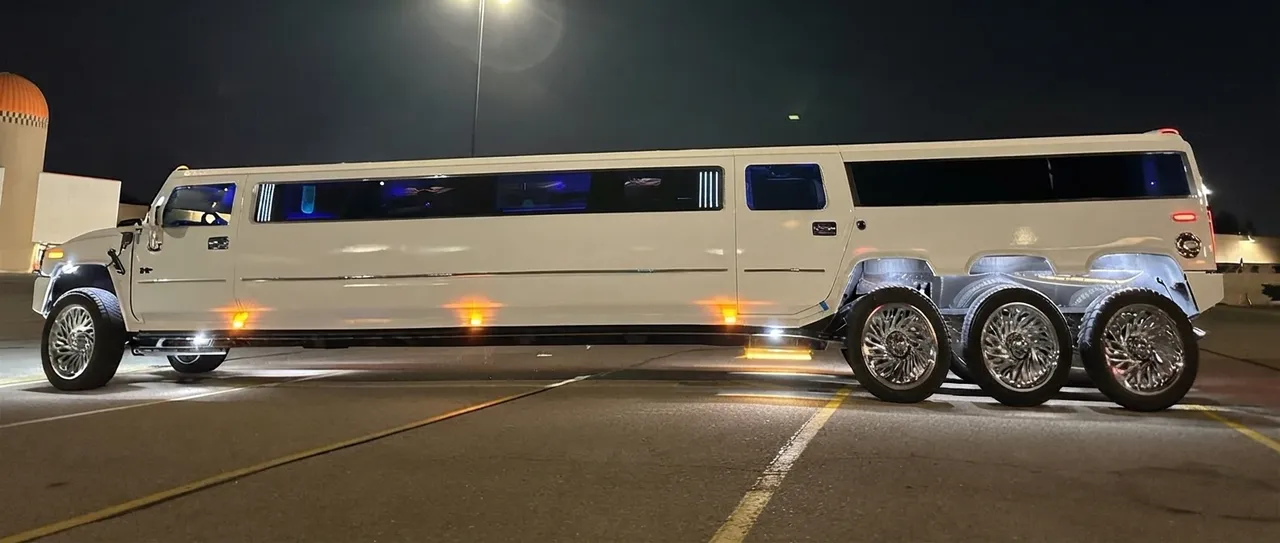 Hummer H2 Triple Axle White for limo rental Hummer H2 Triple Axle White for limo rental