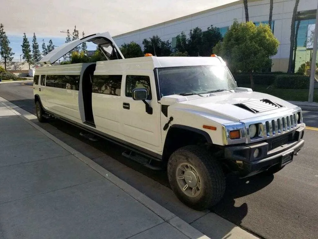 White Hummer Limo exterior, photo 2 for cadillac escalade limo in Reston, VA