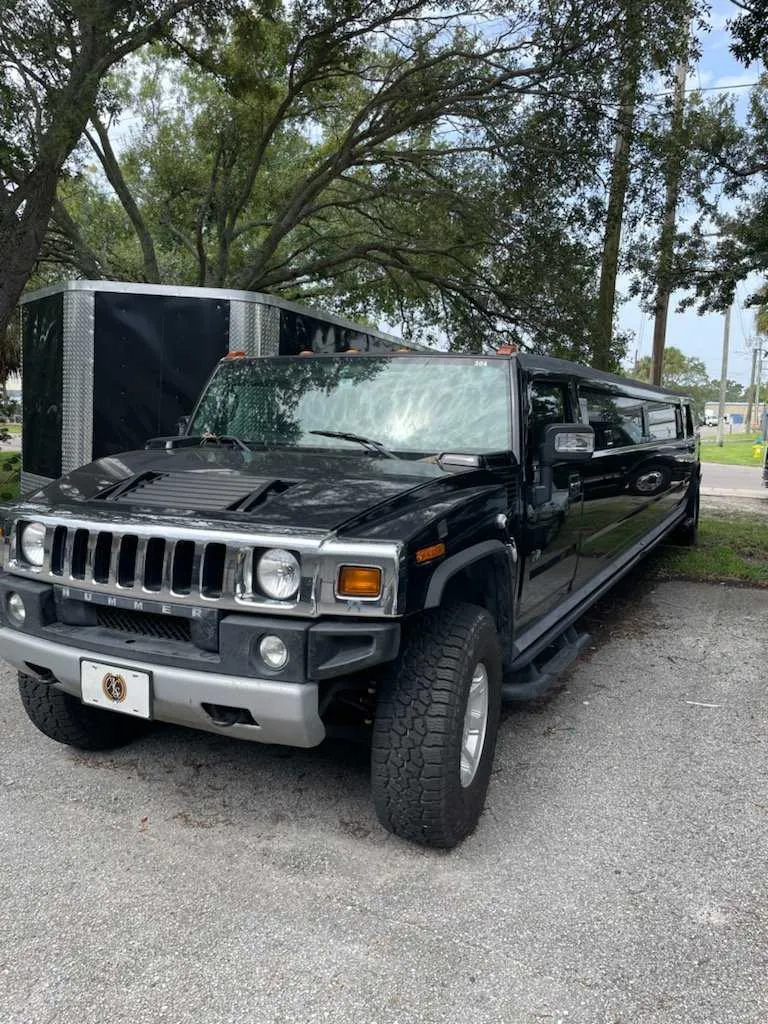 Black Hummer Limo exterior, photo 2 for cadillac escalade limo in Saint Johns, FL