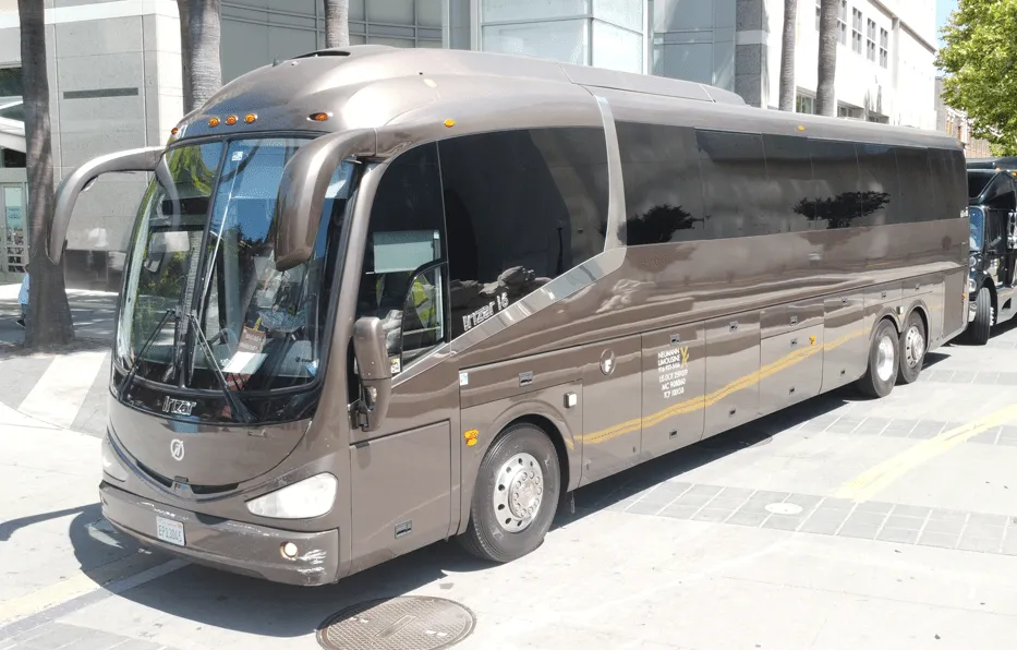 Brown Irizar Motorcoach for charter bus rental in Glennville, GA