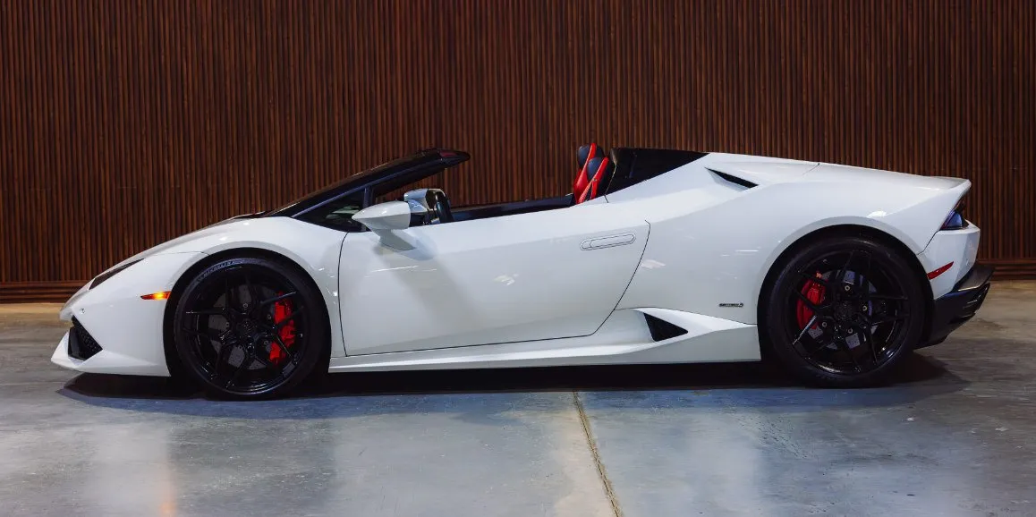 White Lamborghini Huracan exterior with convertible roof for sports car rental