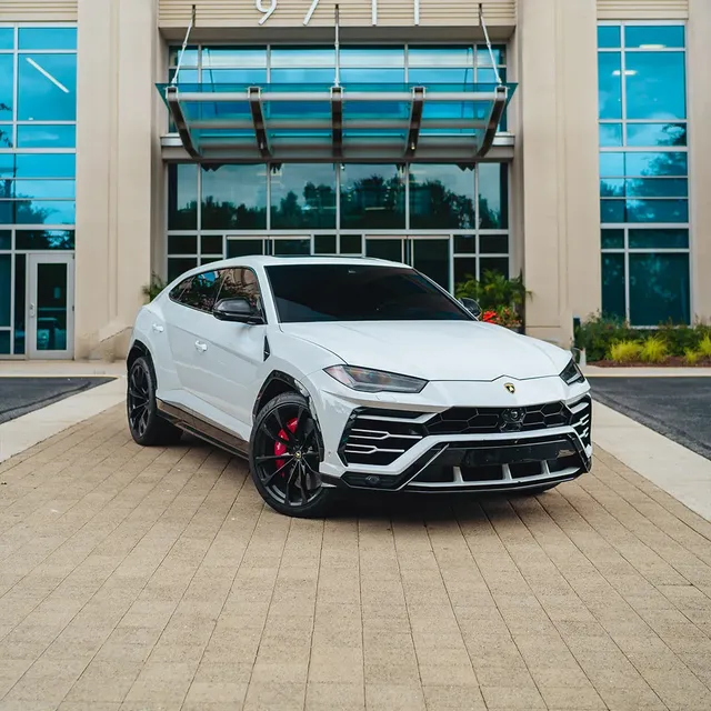 Lamborghini Urus Ibis White for airport transfers
