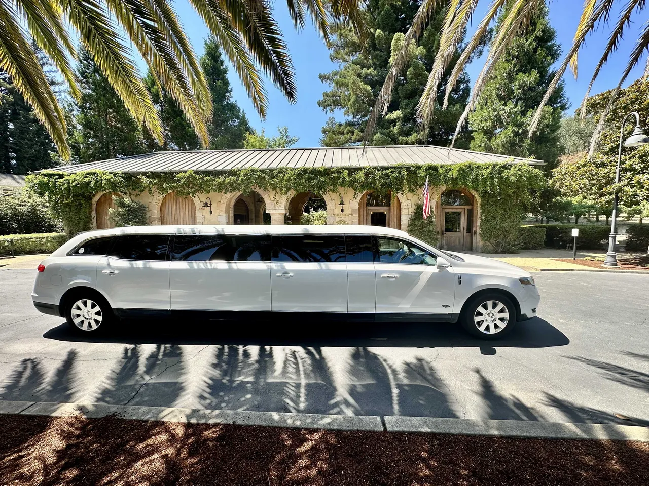 White Lincoln MKT Limo exterior, photo 2 for cadillac escalade limo in Selah, WA