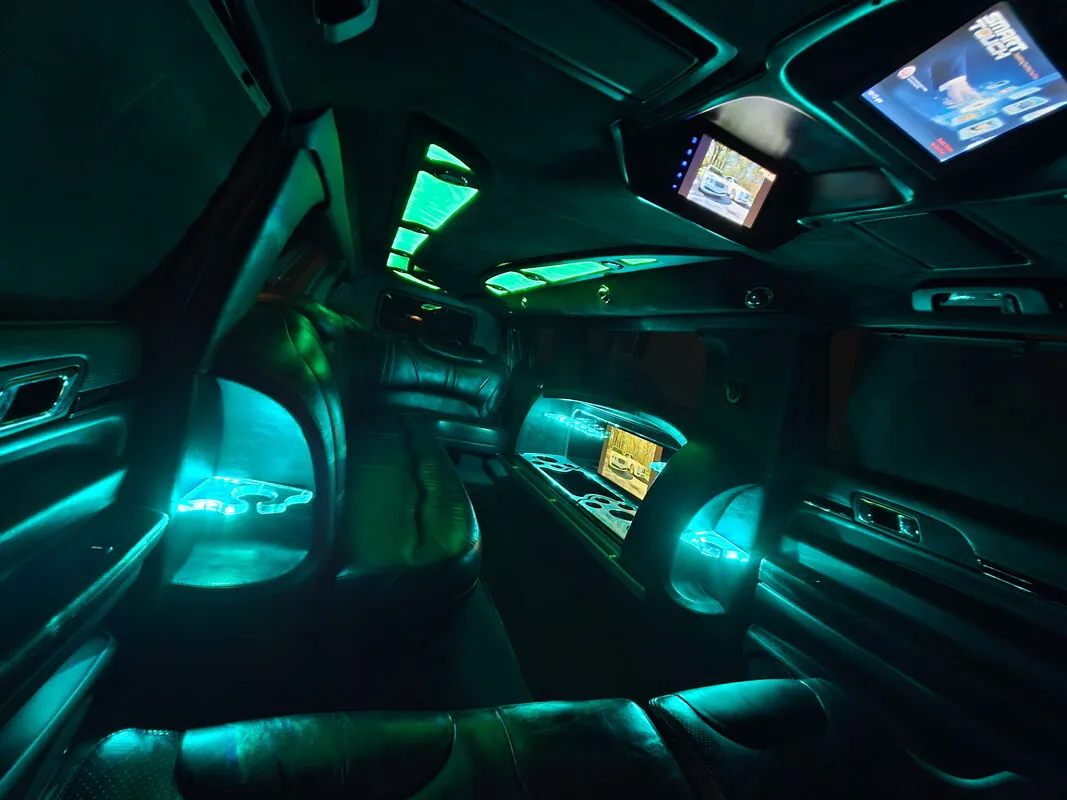 Lincoln MKT Limousine interior with LED accent lighting and TV screens, photo 4 for limo rental Lincoln MKT Limousine interior with LED accent lighting and TV screens, photo 4 for limo rental