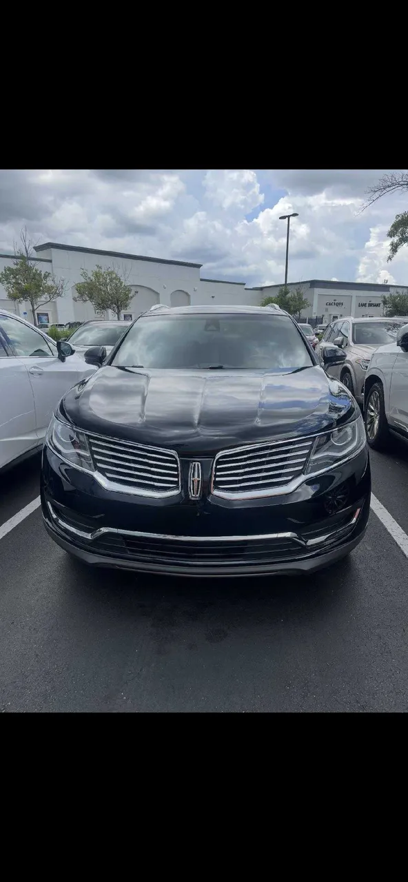 Black Lincoln MKX for sedan rental in Panacea, FL