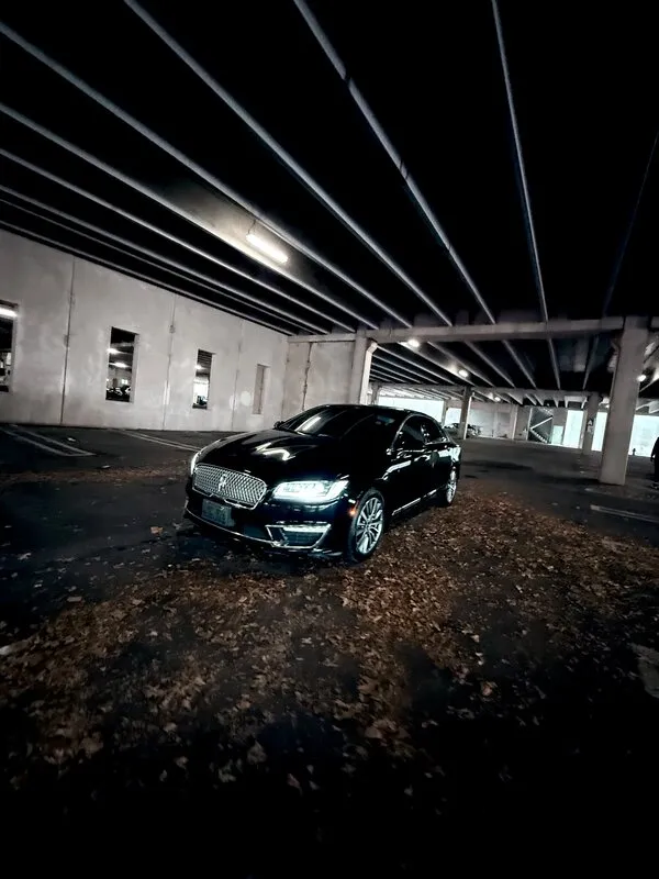 Black Lincoln MKZ exterior for sedan rental Black Lincoln MKZ exterior for sedan rental
