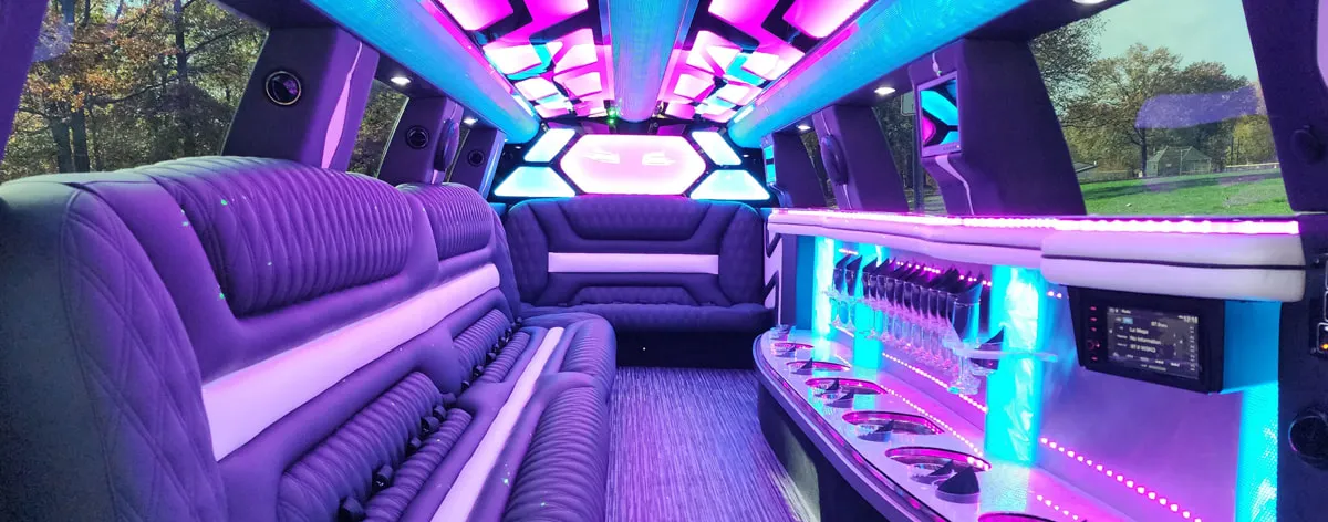 22 Passenger Lincoln Navigator interior with LED accent lighting, LED ceiling lighting and bar area for limo rental 22 Passenger Lincoln Navigator interior with LED accent lighting, LED ceiling lighting and bar area for limo rental