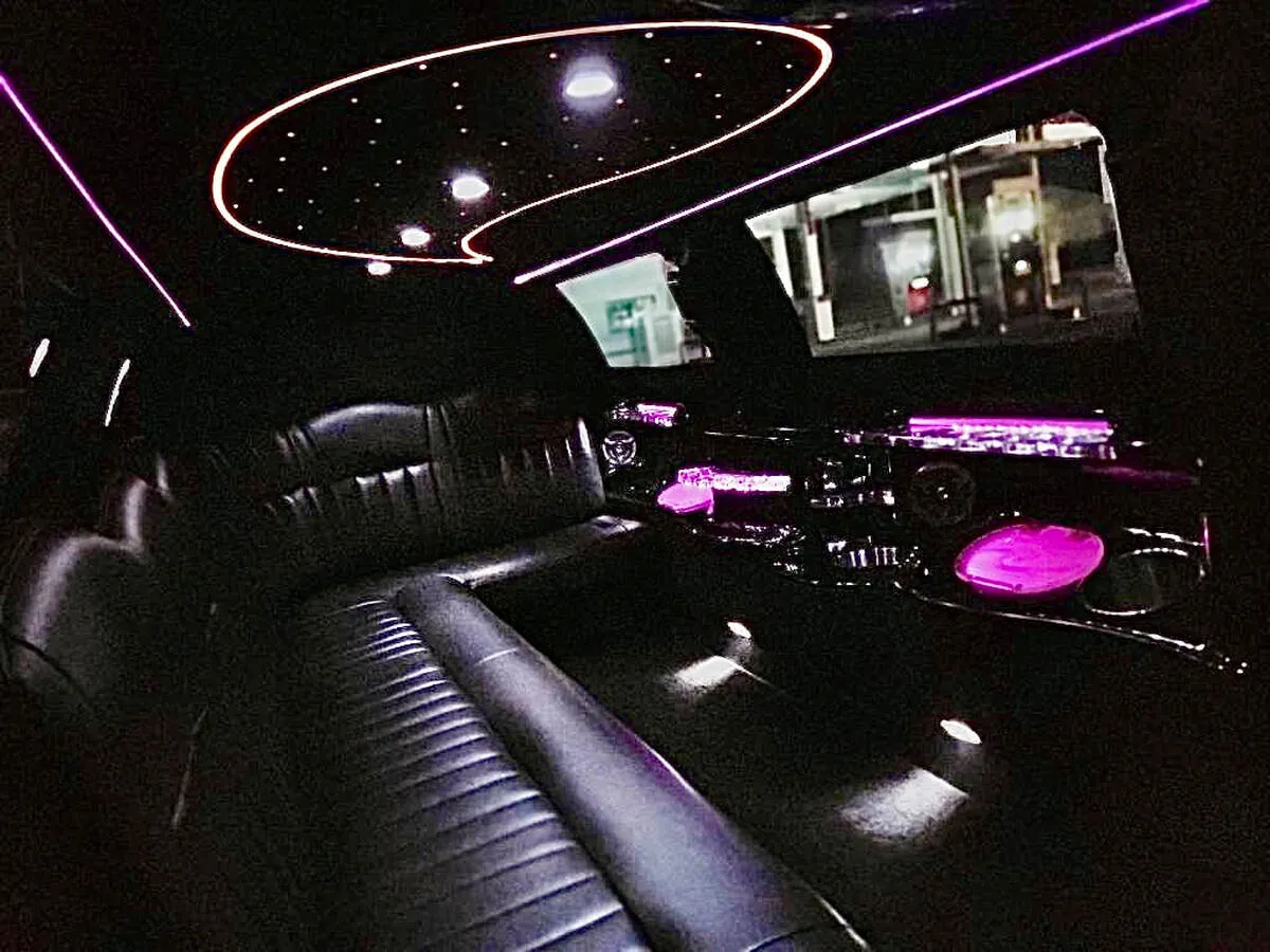 Lincoln Town Car Limousine interior with starlight or fiber-optic ceiling, photo 9 for prom car rental in North Attleboro, MA Lincoln Town Car Limousine interior with starlight or fiber-optic ceiling, photo 9 for prom car rental in North Attleboro, MA
