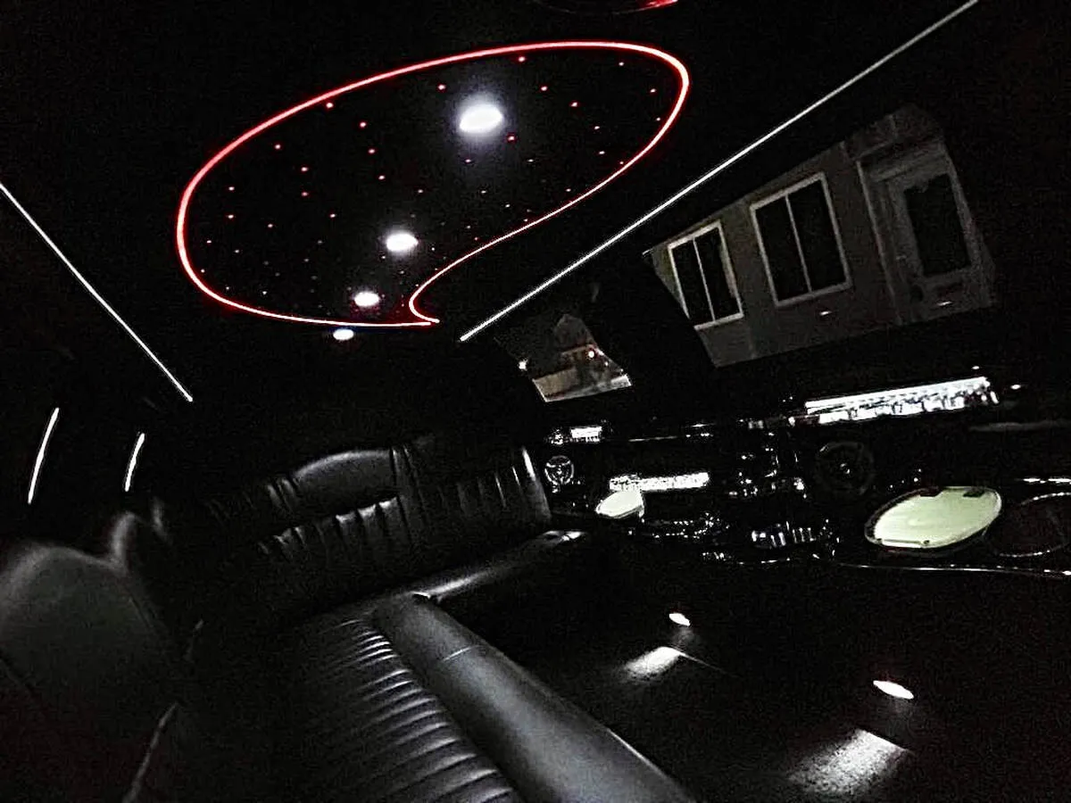 Lincoln Town Car Limousine interior with starlight or fiber-optic ceiling, photo 7 for prom car rental in North Attleboro, MA Lincoln Town Car Limousine interior with starlight or fiber-optic ceiling, photo 7 for prom car rental in North Attleboro, MA