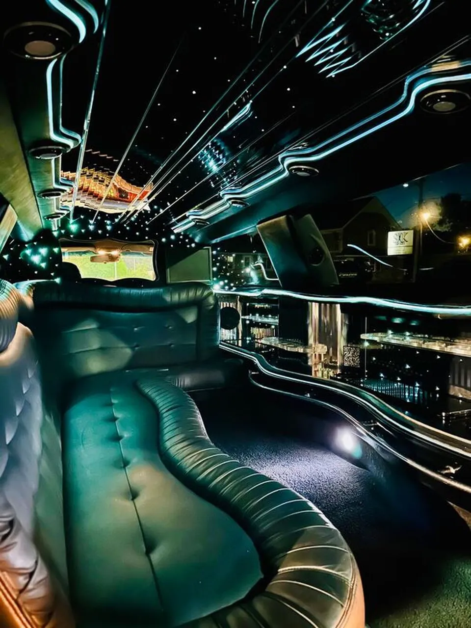 Lincoln Town Car Limousine interior with sofa-style seating, LED accent lighting and starlight or fiber-optic ceiling, photo 11 for limo rental in North Attleboro, MA Lincoln Town Car Limousine interior with sofa-style seating, LED accent lighting and starlight or fiber-optic ceiling, photo 11 for limo rental in North Attleboro, MA