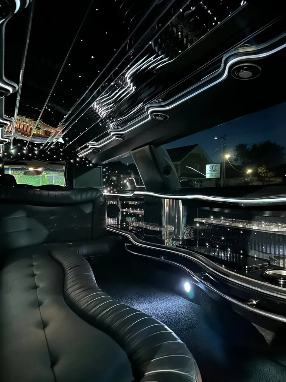 Lincoln Town Car Limousine interior with sofa-style seating, LED accent lighting and starlight or fiber-optic ceiling, photo 12 for limo rental in North Attleboro, MA Lincoln Town Car Limousine interior with sofa-style seating, LED accent lighting and starlight or fiber-optic ceiling, photo 12 for limo rental in North Attleboro, MA