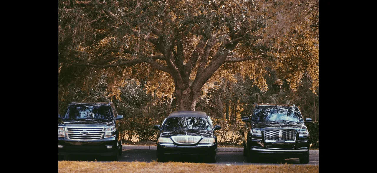 Black Lincoln Town car Stretch Limousine exterior, photo 2 for cadillac escalade limo in Hollister, FL