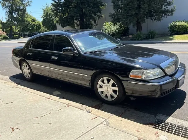 Black Lincoln Town Car for sedan rental Black Lincoln Town Car for sedan rental
