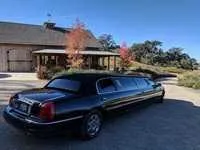 Black Lincoln Towncar Limousine exterior, photo 2 for prom car rental in Carpinteria, CA