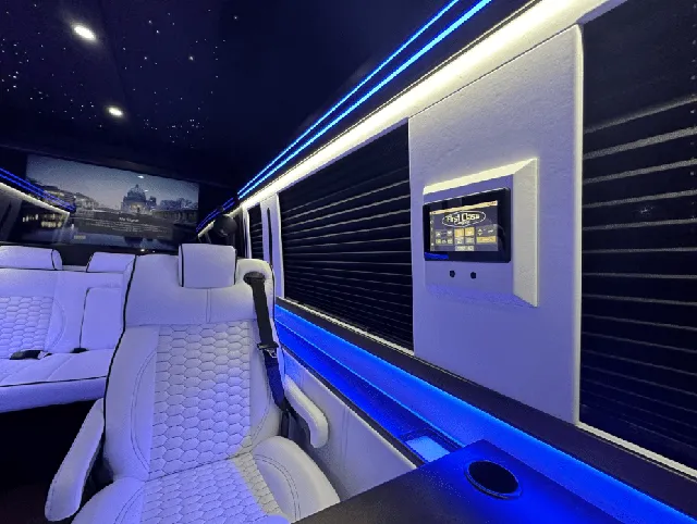 Luxury Mercedes Sprinter interior with captain's chairs, window shades and LED accent lighting, photo 4 for winery tour transport in New Braunfels, TX
