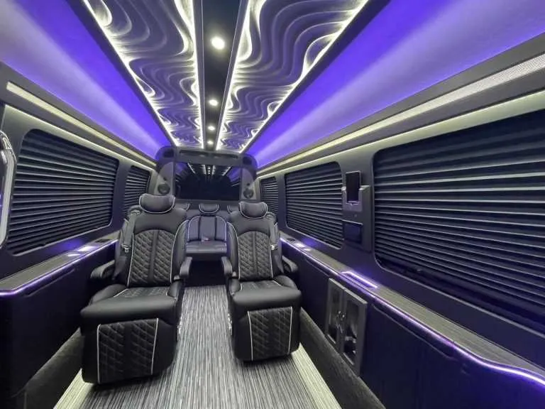 Luxury Mercedes Sprinter interior with captain's chairs, window shades and LED accent lighting, photo 5 for winery tour transport in New Braunfels, TX