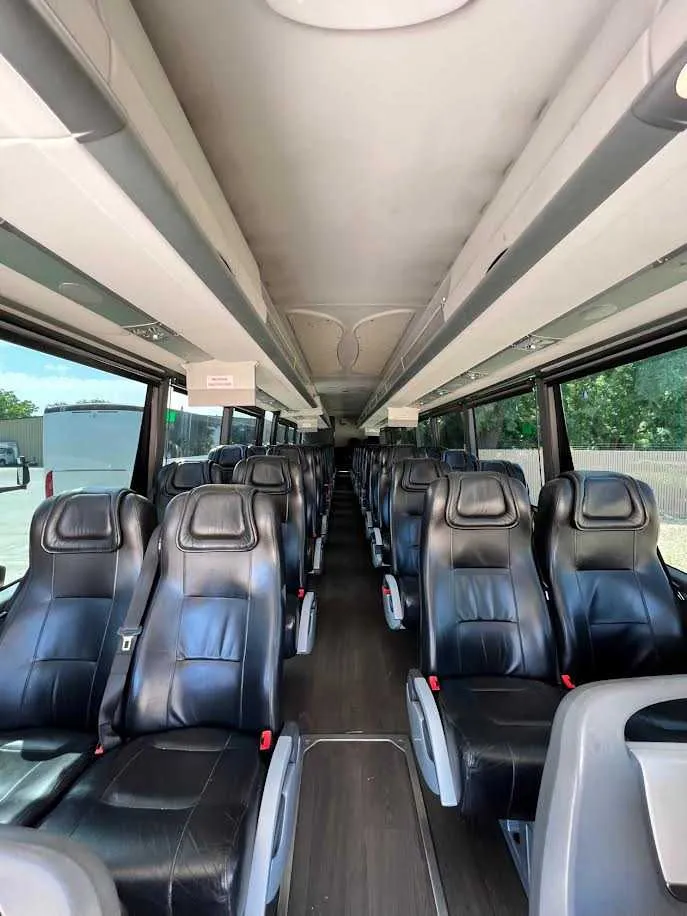 White MCI Motorcoach, photo 2 for charter bus rental