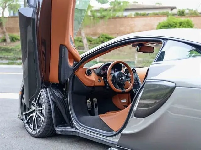 Silver McLaren 570S, photo 9 for exotic car rental in Houston, TX Silver McLaren 570S, photo 9 for exotic car rental in Houston, TX