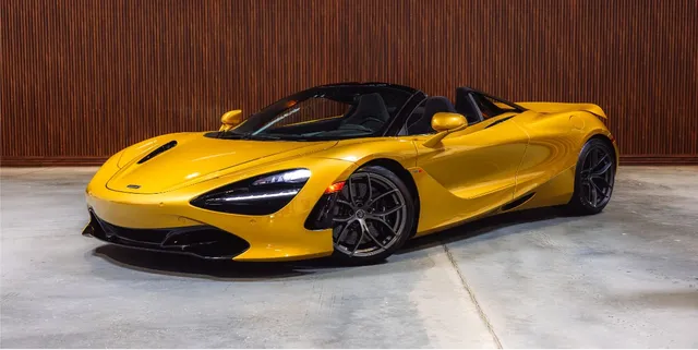 Yellow Mclaren 720s with convertible roof for sports car rental
