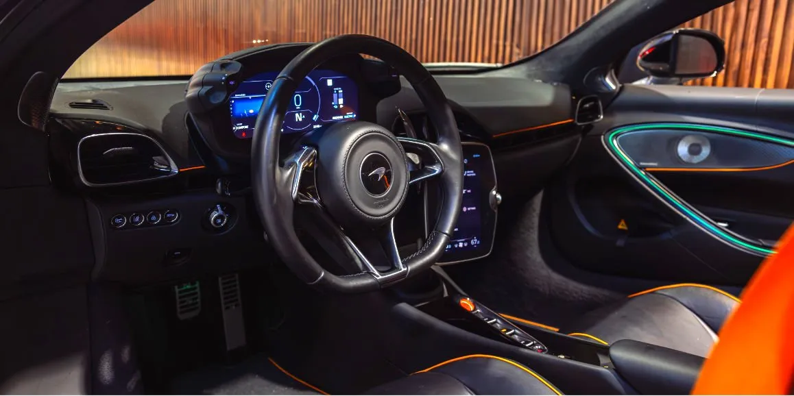 McLaren Artura interior with LED accent lighting for sports car rental McLaren Artura interior with LED accent lighting for sports car rental