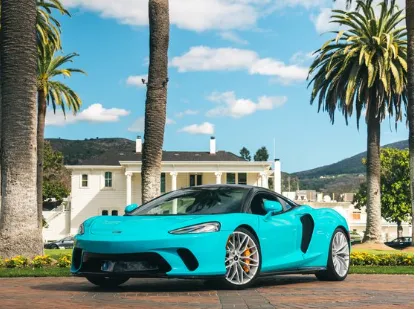 Blue McLaren GT, photo 3 for exotic car rental
