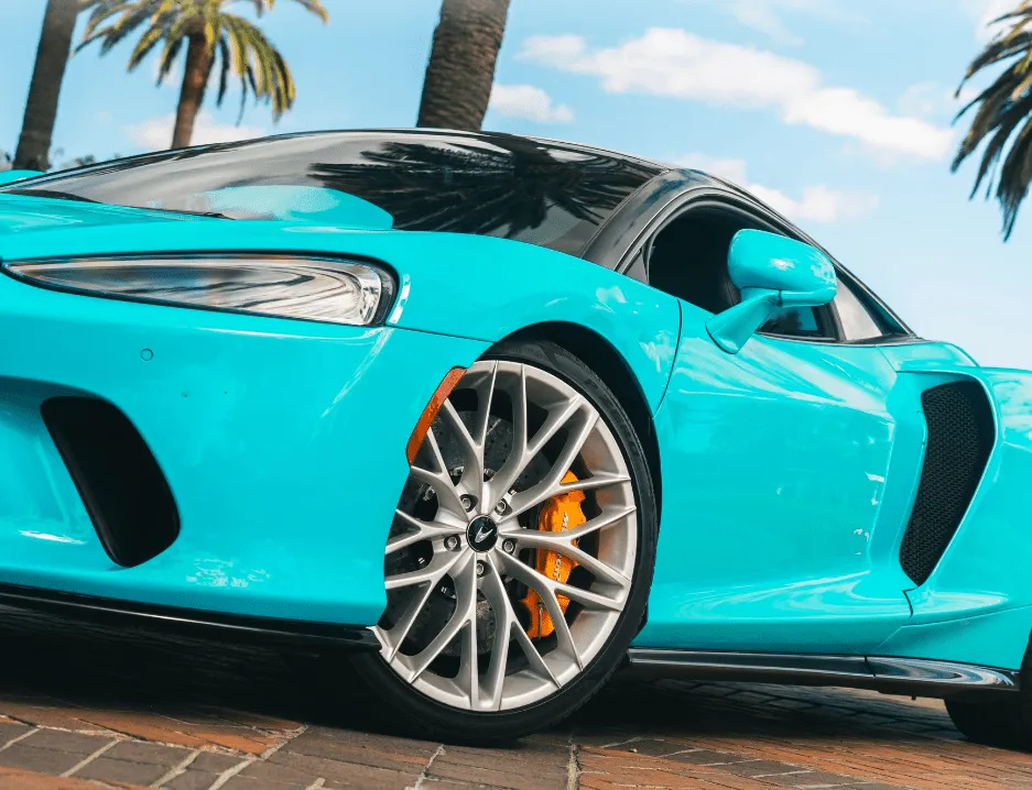 Blue McLaren GT for exotic car rental