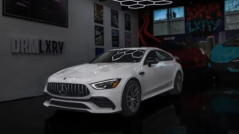 White Mercedes-AMG GT53 for sports car rental White Mercedes-AMG GT53 for sports car rental