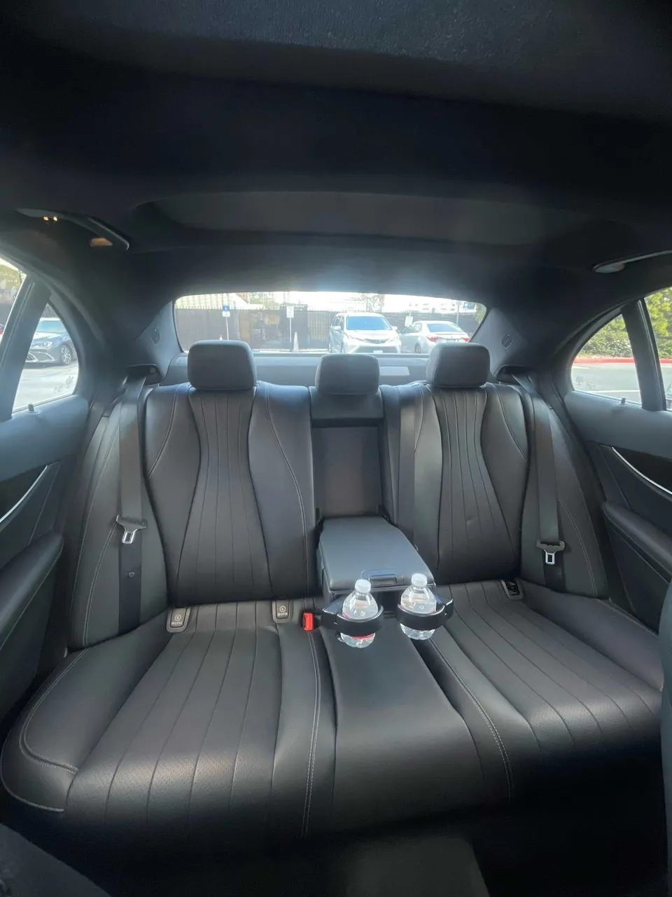 Mercedes-Benz E350 interior with cup holders for black car service in Kern County, CA Mercedes-Benz E350 interior with cup holders for black car service in Kern County, CA