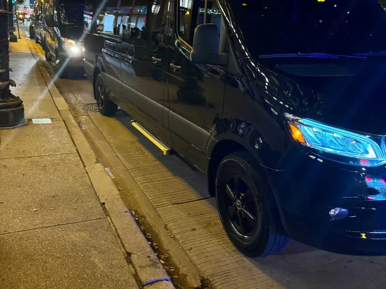 Black Mercedes-Benz Executive Sprinter for party bus rental
