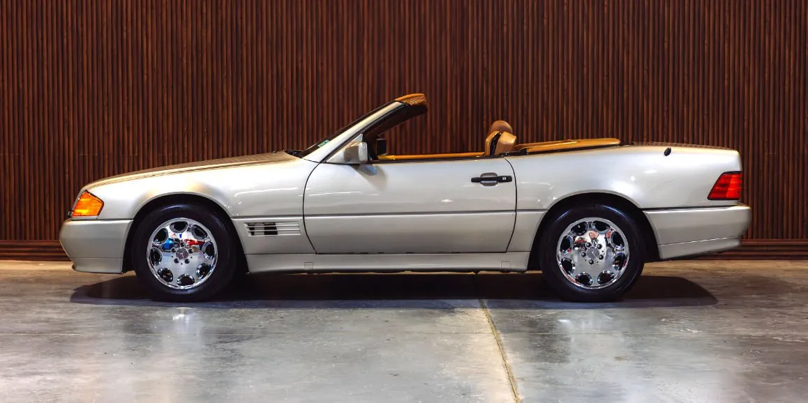 Silver Mercedes-Benz SL500 exterior with convertible roof, photo 3 for luxury car rental in Toms River, NJ Silver Mercedes-Benz SL500 exterior with convertible roof, photo 3 for luxury car rental in Toms River, NJ