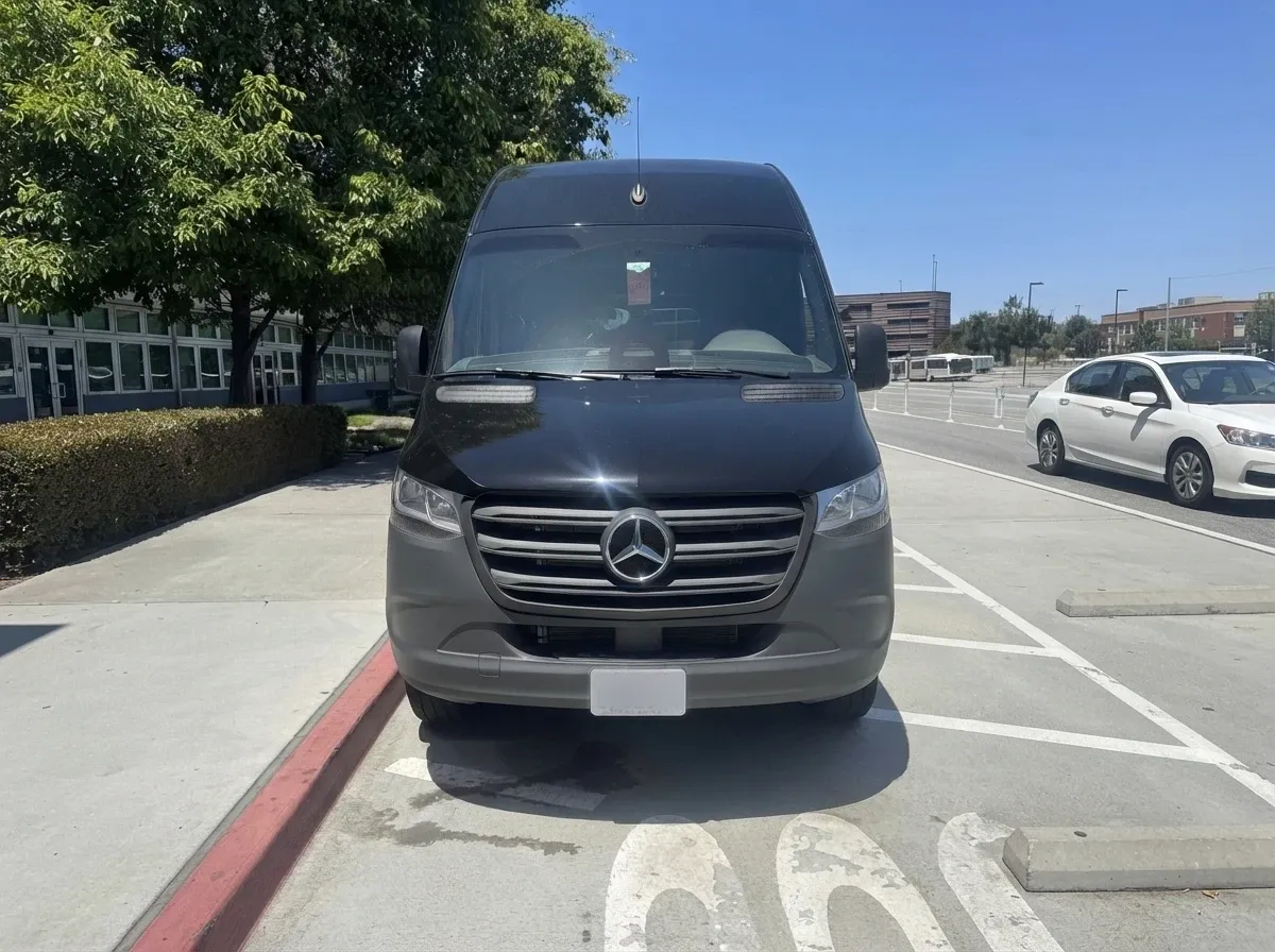 Black Mercedes-Benz Sprinter for minibus rental