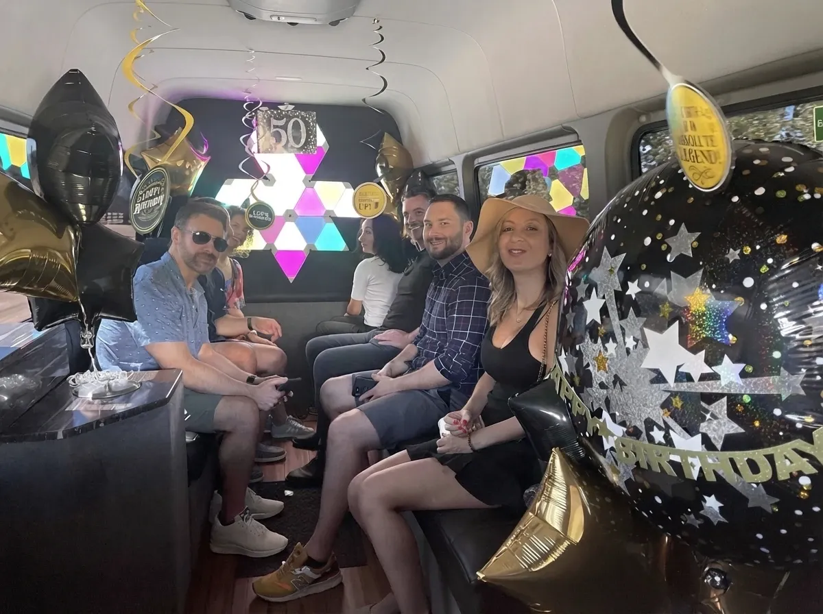 Black Mercedes-Benz Sprinter Limousine for party bus rental Black Mercedes-Benz Sprinter Limousine for party bus rental