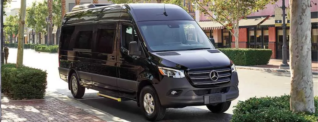 Black Mercedes Exec Sprinter exterior with tinted windows and running boards for mercedes sprinter rental in Washington