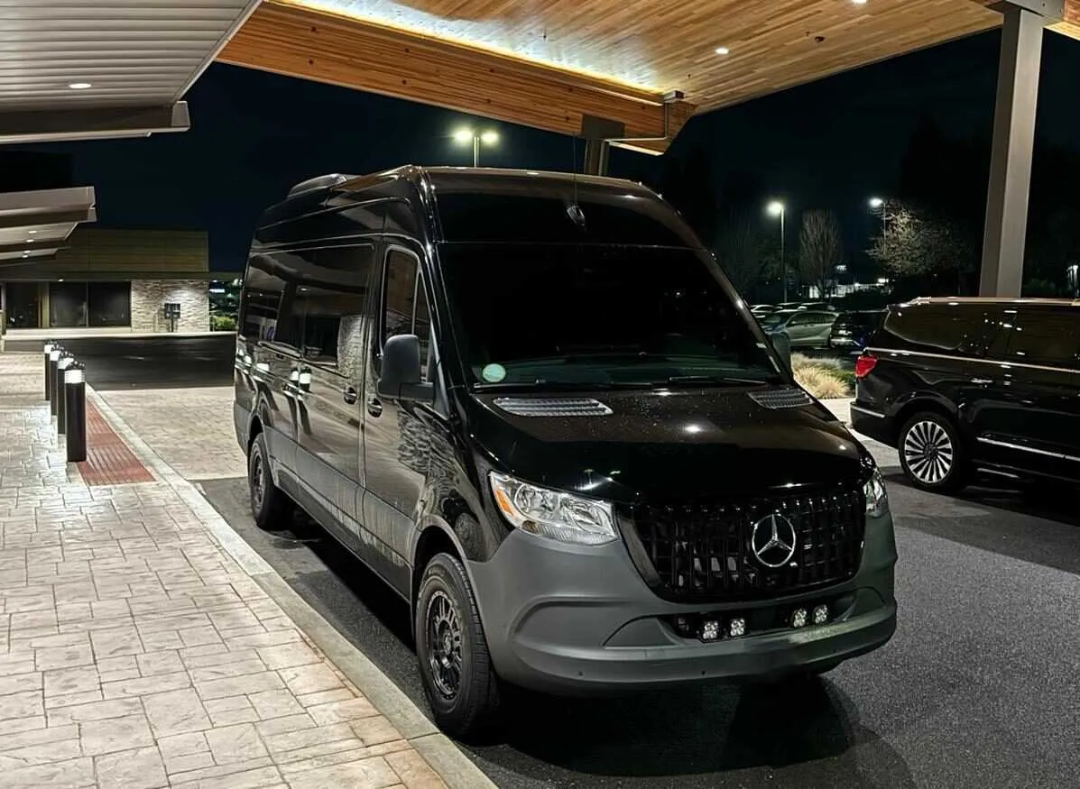 Black Mercedes Executive Sprinter for mini coach rental in Vader, WA