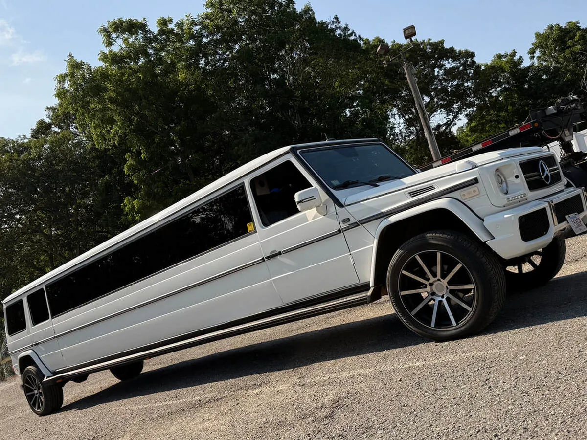White Mercedes-Benz G Wagon with tinted windows for limo rental